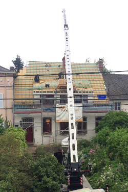 travail sur la charpente d'une toiture à Mont-Saint-Guibert